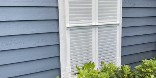 White Impact Colonial Shutters | West Shore Construction