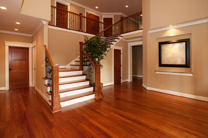 foyer and stairs leading to second floor